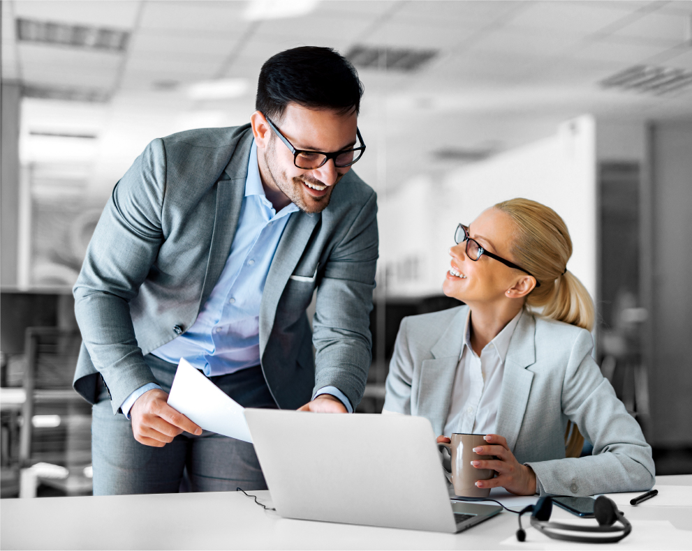 male and remale coworkers researching Cadency by Trintech Financial Close Platform