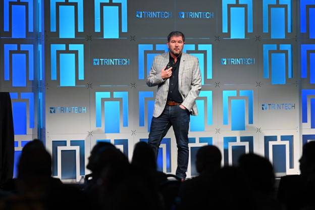 Trintech CEO Darren Heffernan on stage at Trintech Connect North American